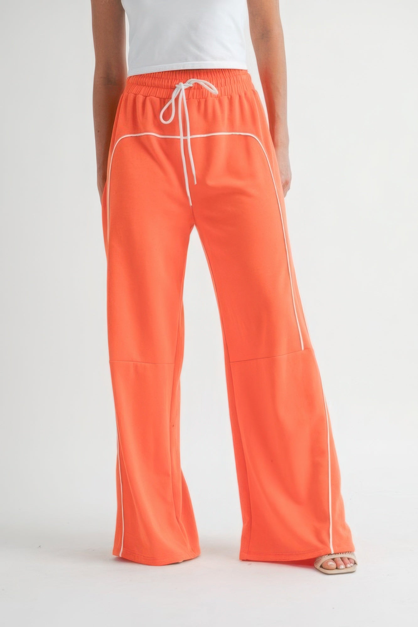 Drawstring pants in vibrant color with a relaxed fit and adjustable waist, perfect for casual comfort and style.