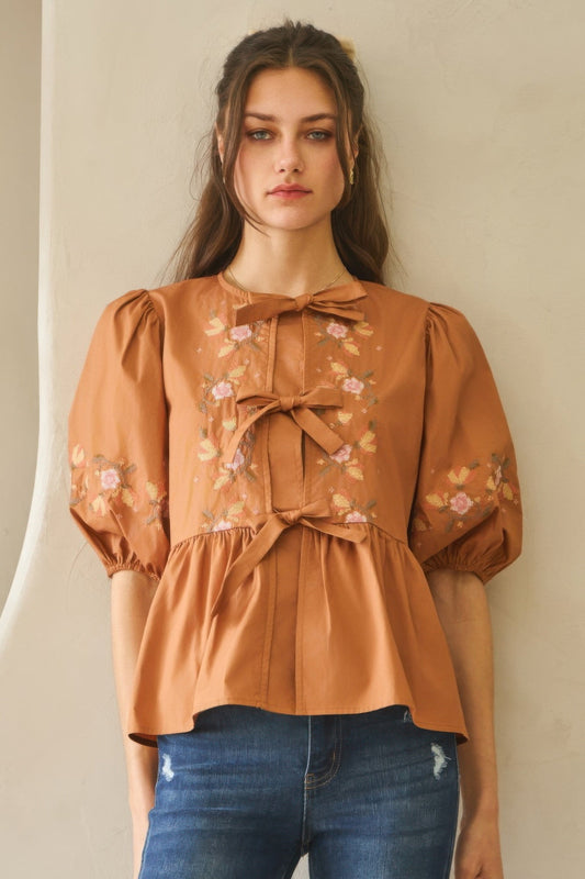 Poplin Front Ribbon Tie Blouse with embroidery and feminine tie detail.